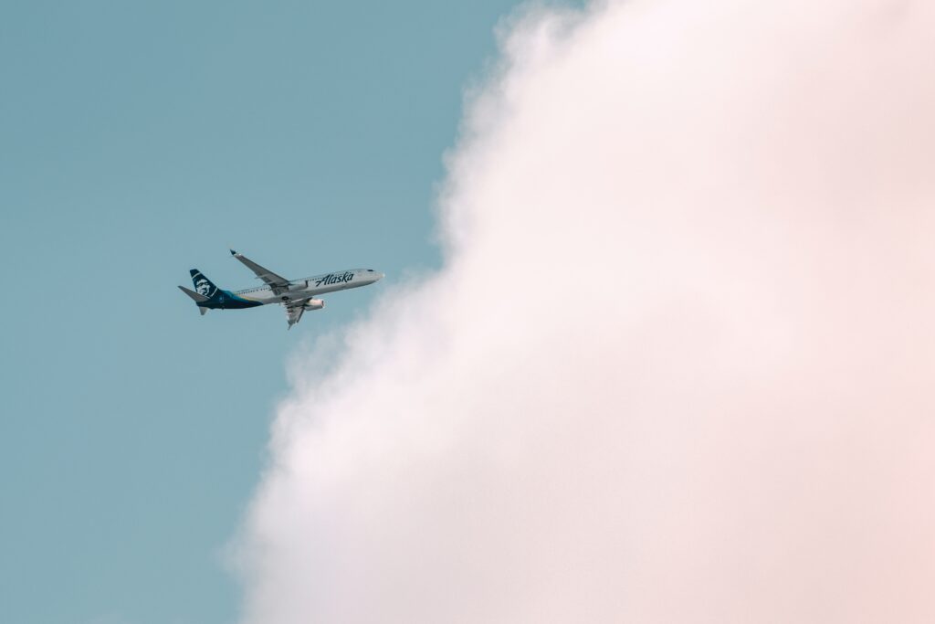 Plane flying into clouds