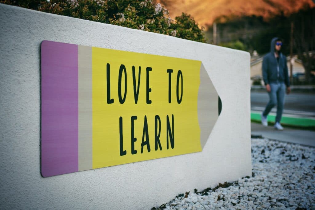 Love to learn sign on wall data protection training and data education is about the love to learn about data and develop data literacy